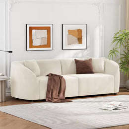 Clara Modern Curved 3-Seater Sofa with Rolled Arms, Velvet Upholstery, and Accent Pillows – Beige